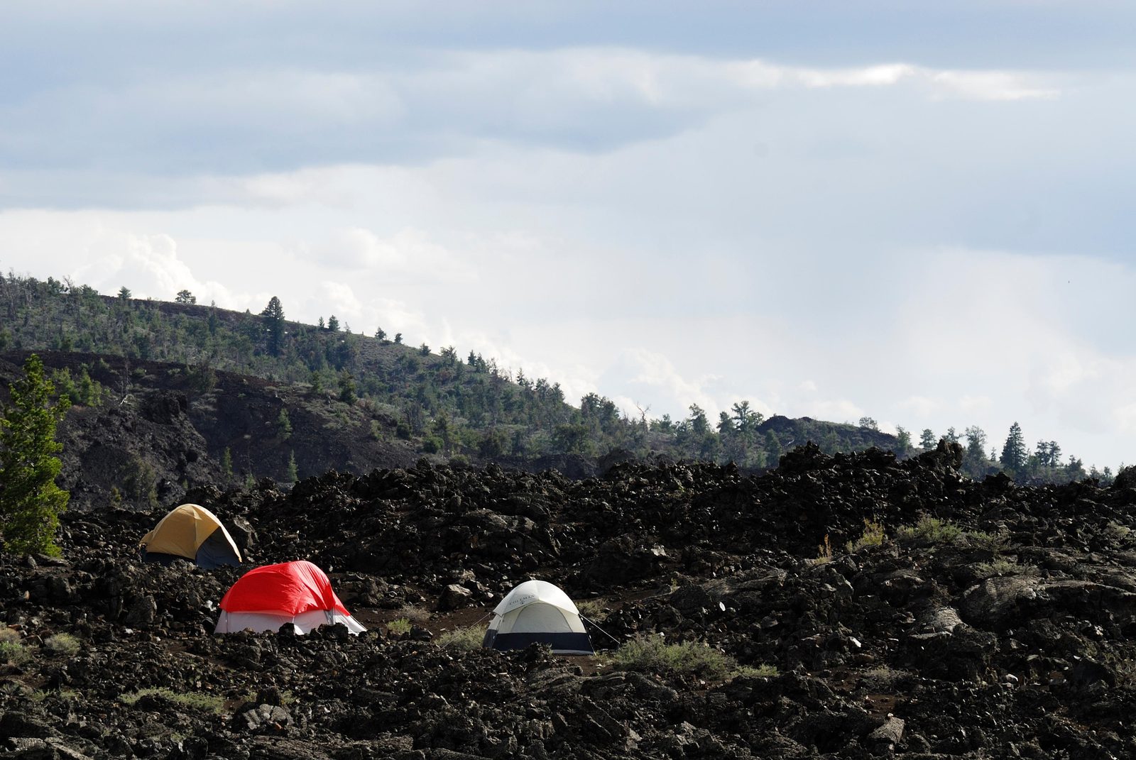 The Lava Flow Campground offers 42 sites nestled among the black lava rocks between the visitor center and North Crater