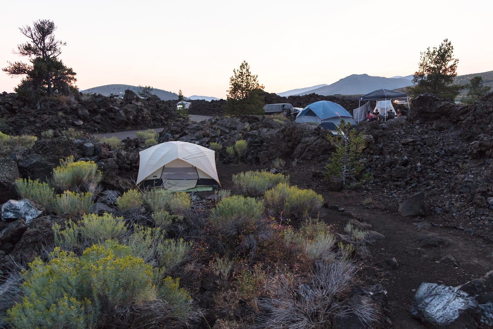 The Lava Flow Campground offers a unique camping experience and is conveniently located near the park visitor center and popular trails