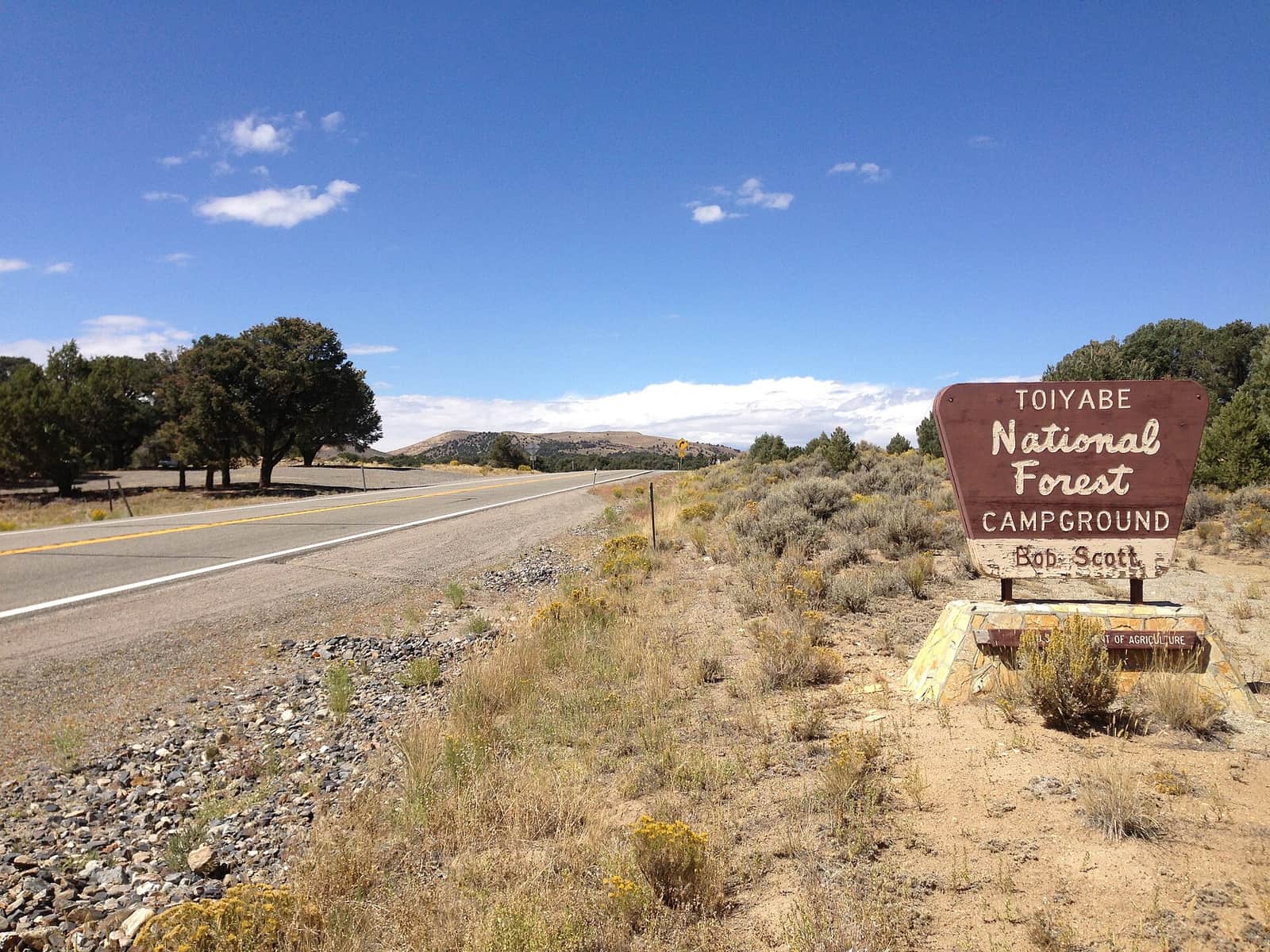 The Toiyabe National Forest sign for Bob Scott Campground beside U.S. Route 50 at Bob Scott Summit