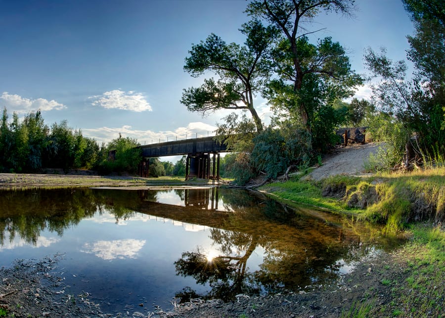 Cottonwoods and a still pool on the Carson River inside Fort Churchill State Historic Park