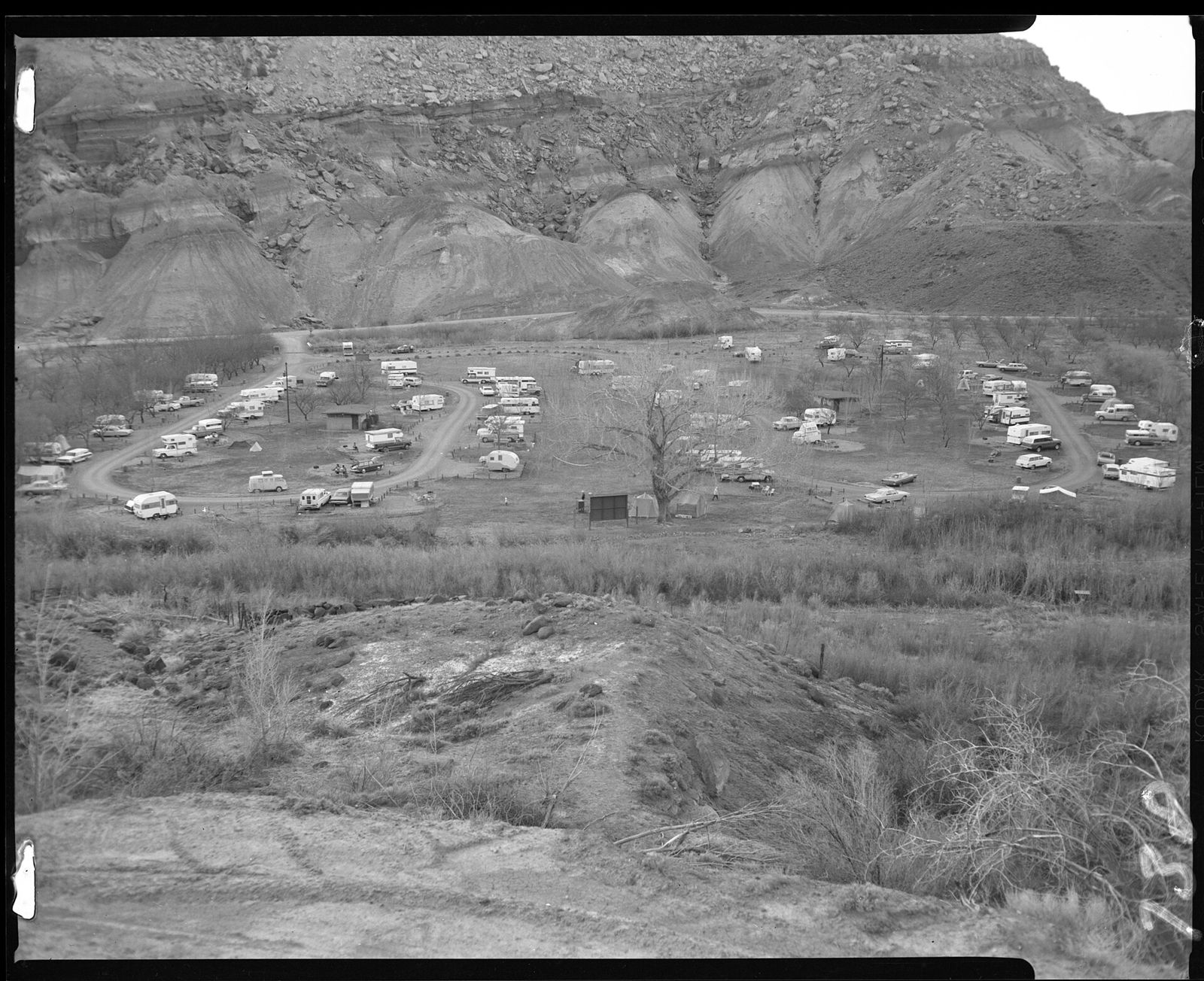 Trailers and cars filling loops A and B of Fruita Campground in 1971, an NPS archive photo