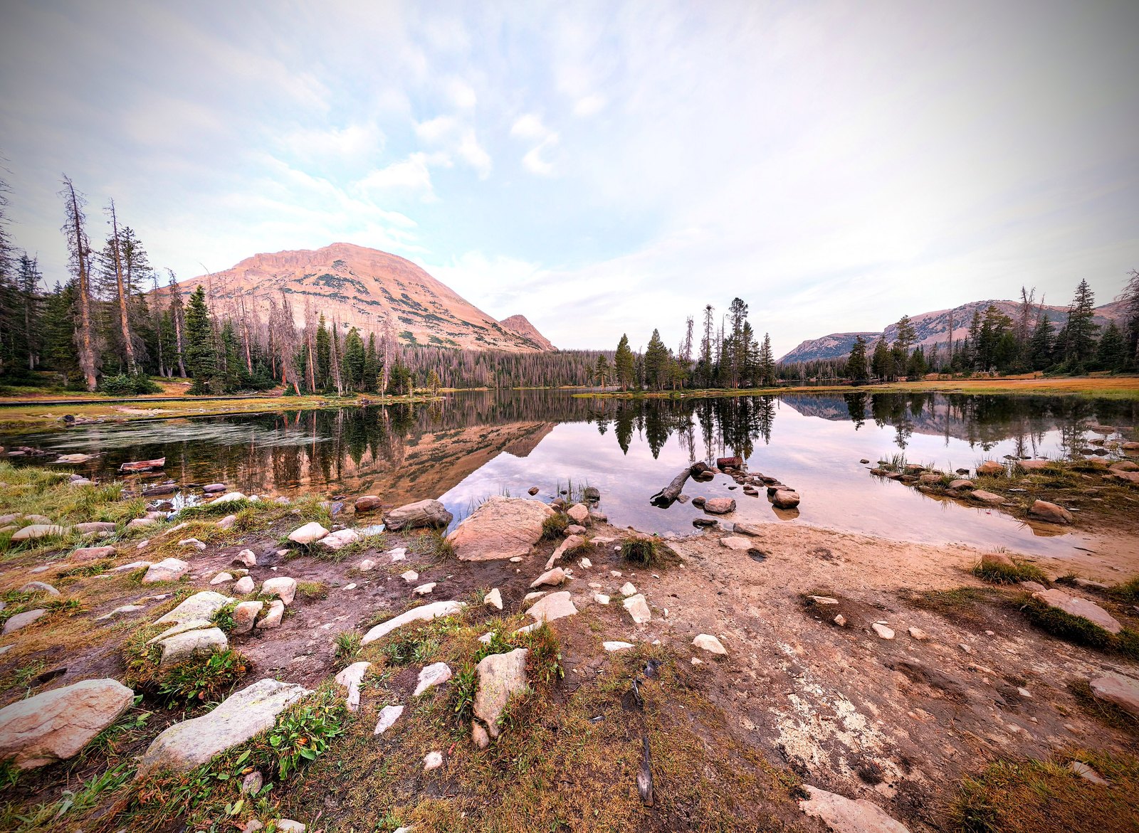 Bald Mountain reflected in Mirror Lake in the Uinta Mountains at sunset