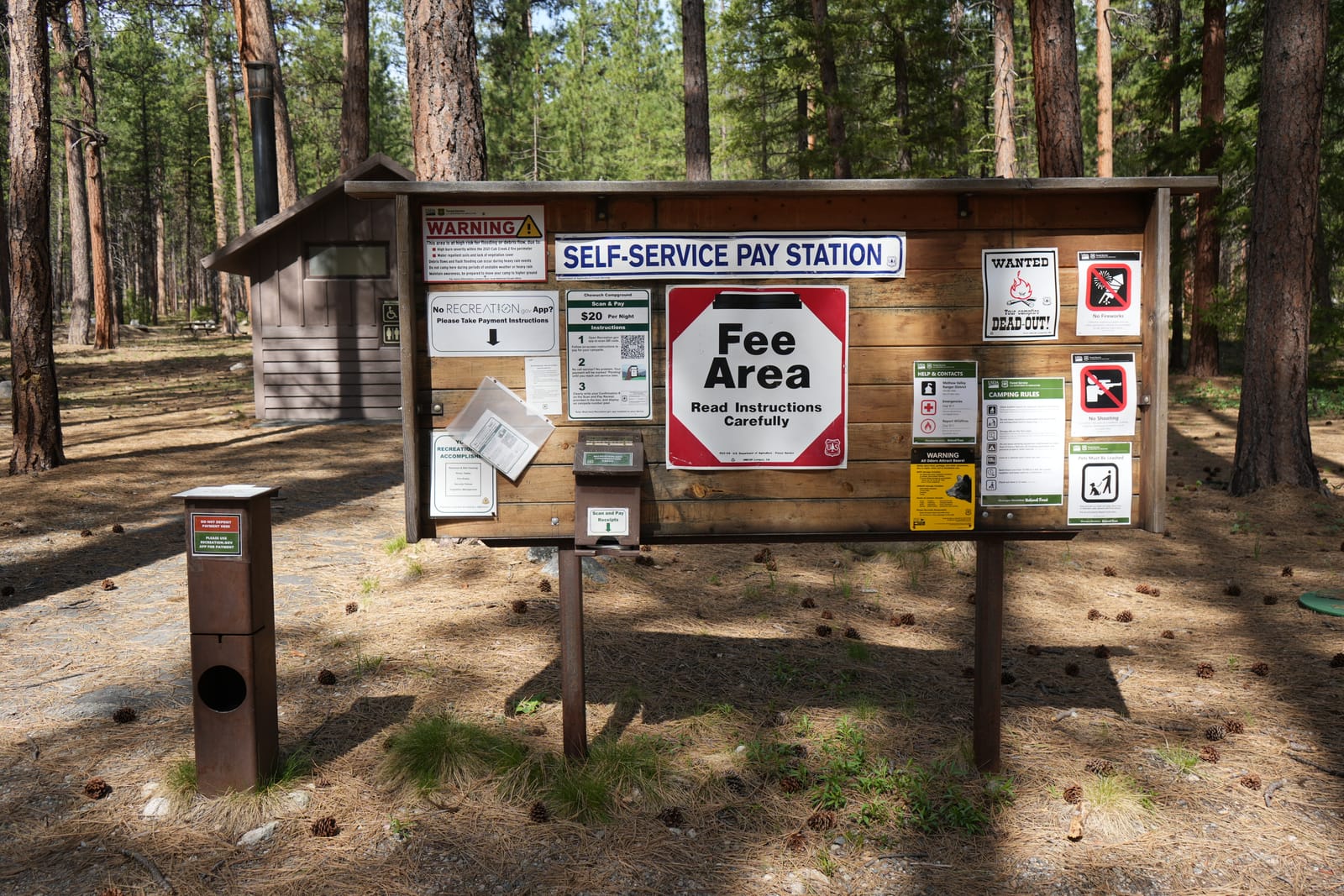 The fee-area board and self-service pay station at Chewuch Campground